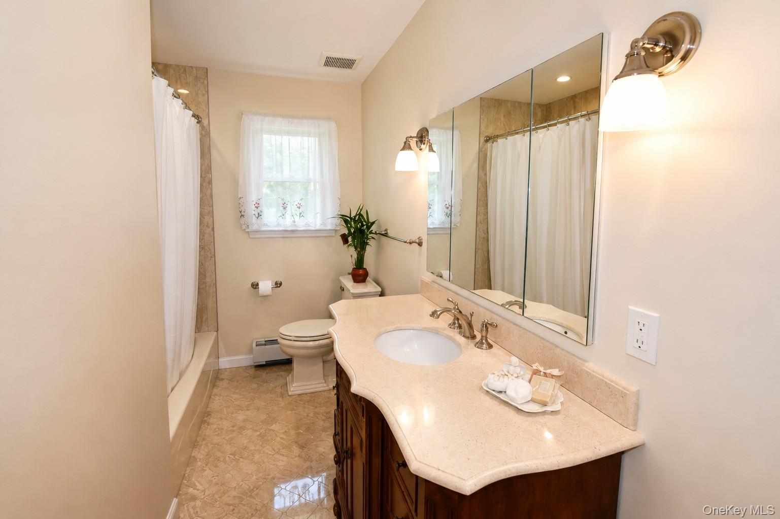 5 Stillwood Road Brookhaven, NY 11719 - Photo 11 of 22 Full bath redone in 2019.
