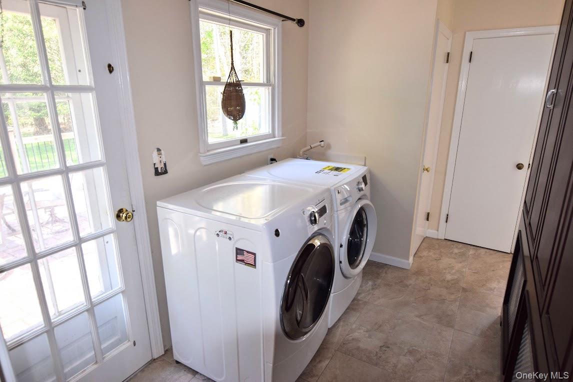 5 Stillwood Road Brookhaven, NY 11719 - Photo 17 of 22 Laundry area near back deck and half bath.