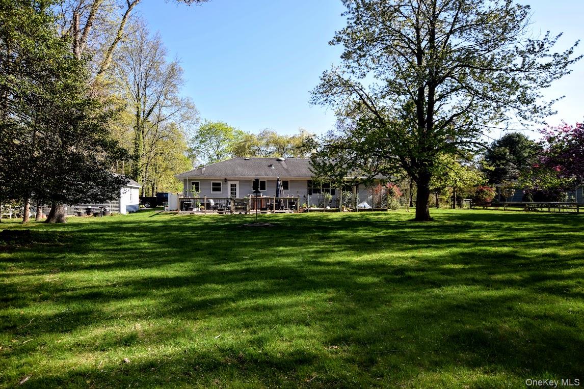 5 Stillwood Road Brookhaven, NY 11719 - Photo 18 of 22 Homes sits on full acre of manicured property.