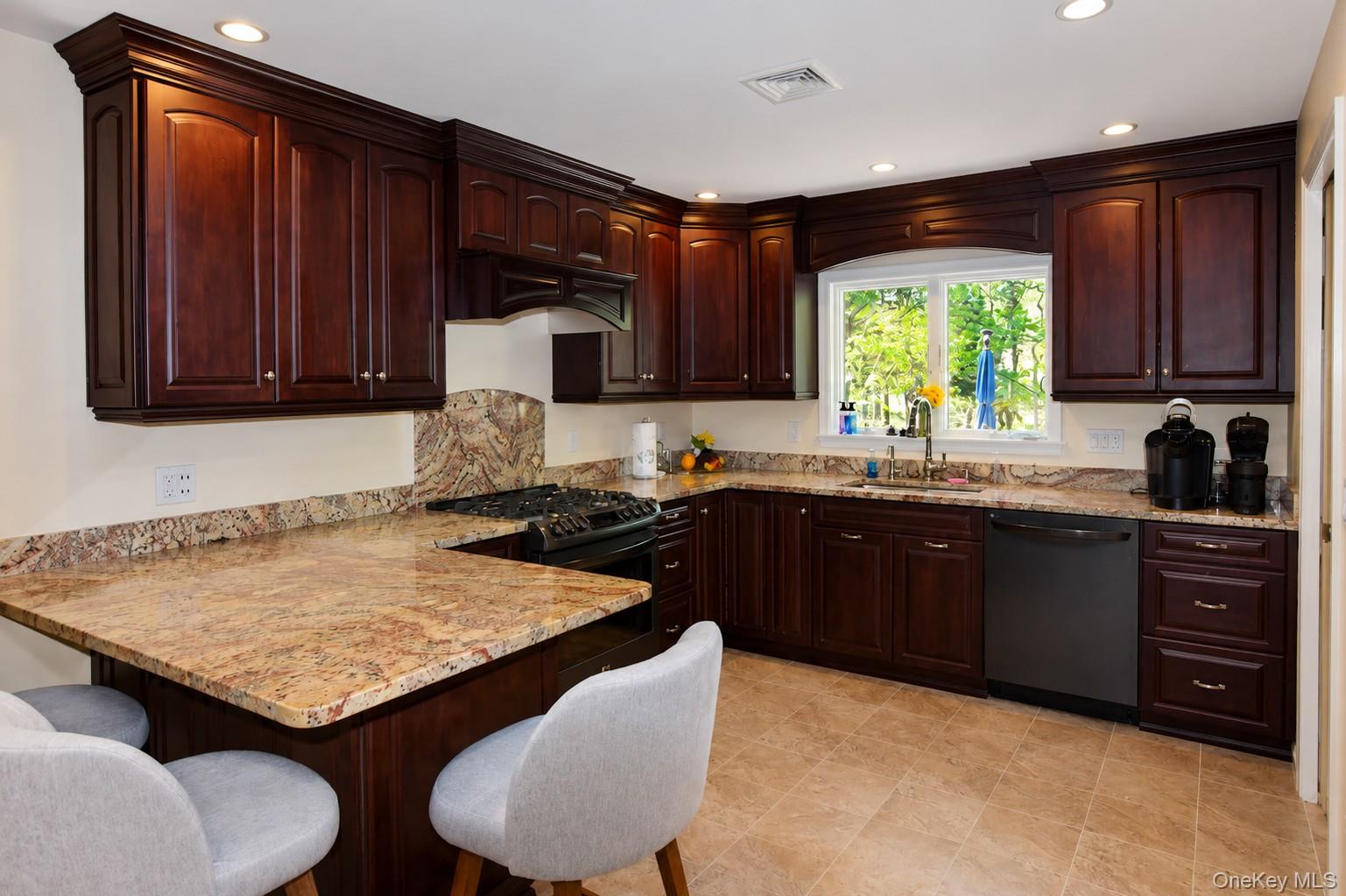 5 Stillwood Road Brookhaven, NY 11719 - Photo 9 of 22 Granite counters and stainless appliances.