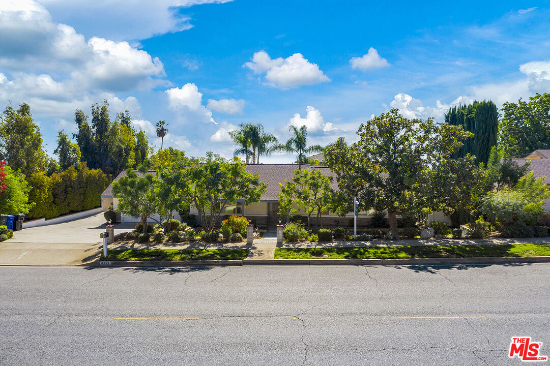 8391 Hillside Road Rancho Cucamonga, CA 91701 - Photo 1 of 51 a view of a park with large trees