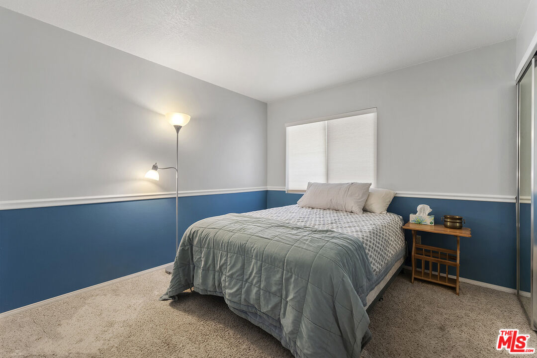 8391 Hillside Road Rancho Cucamonga, CA 91701 - Photo 27 of 51 a room with gym equipment and a table