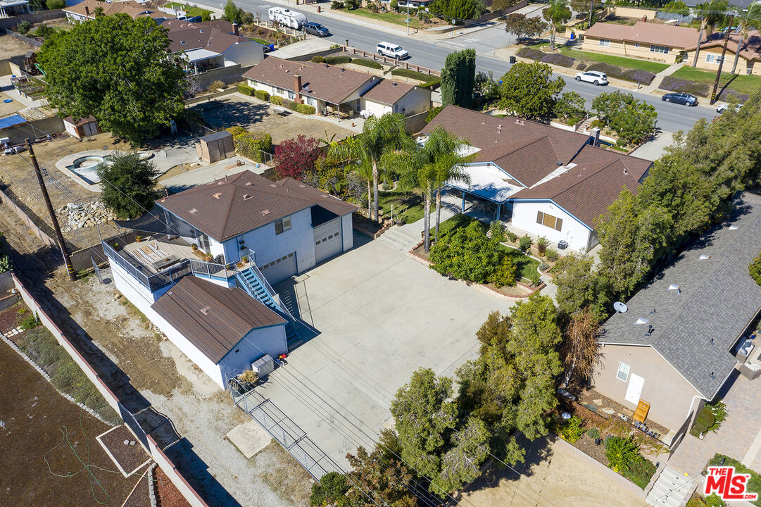8391 Hillside Road Rancho Cucamonga, CA 91701 - Photo 4 of 51 an aerial view of residential houses with outdoor space
