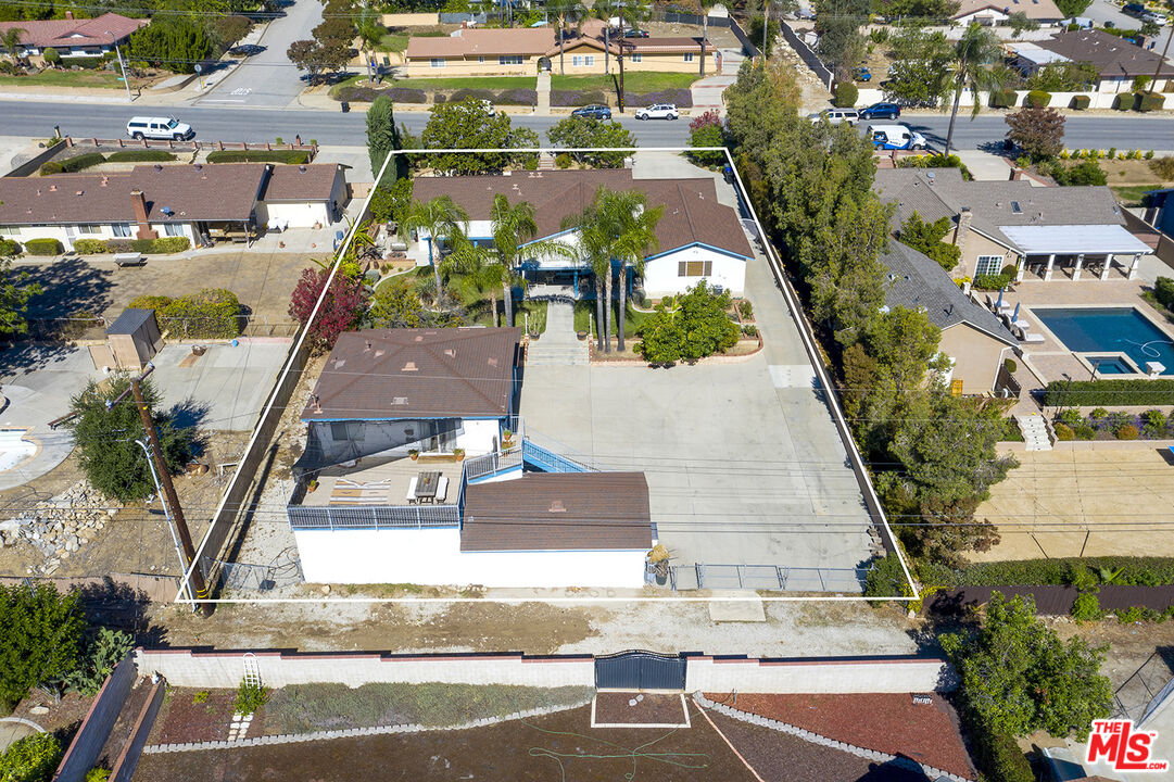 8391 Hillside Road Rancho Cucamonga, CA 91701 - Photo 5 of 51 an aerial view of residential houses with outdoor space