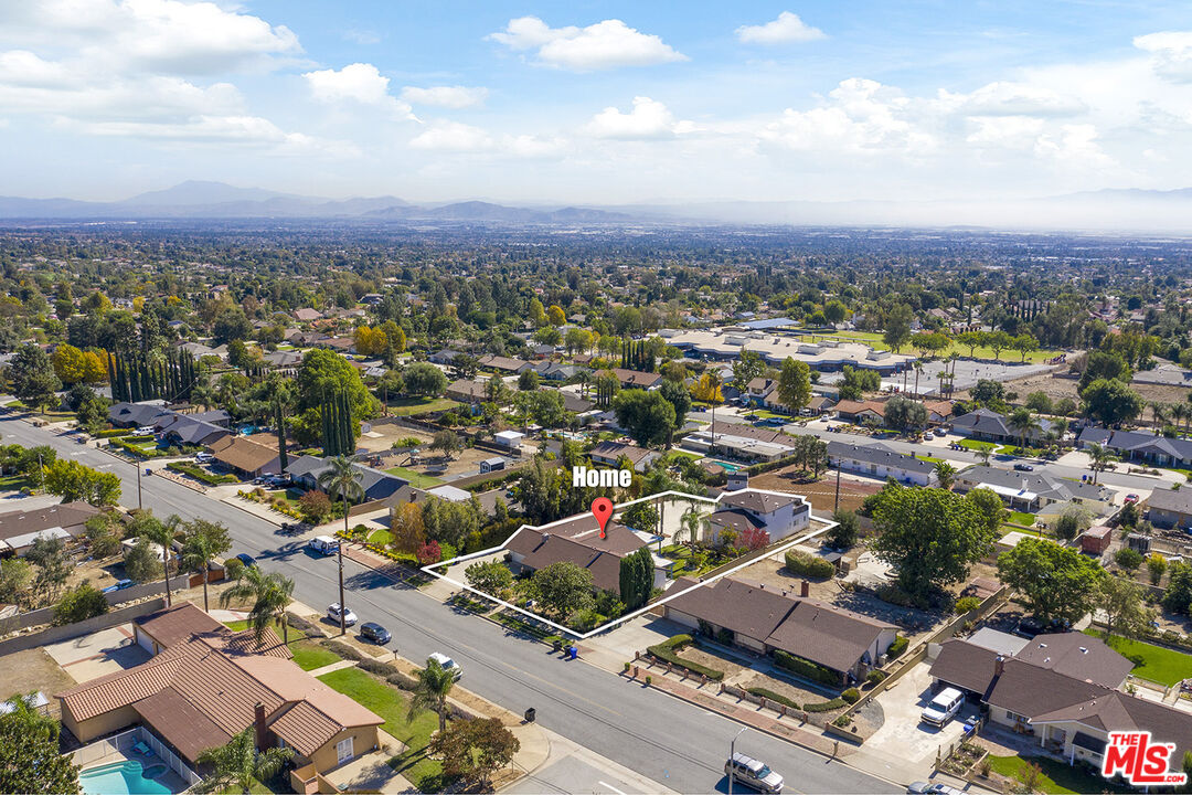 8391 Hillside Road Rancho Cucamonga, CA 91701 - Photo 7 of 51 an aerial view of residential houses with outdoor space