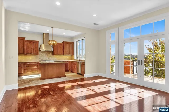 a large bathroom with a large tub and sink