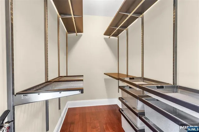 a bedroom with bed and deck