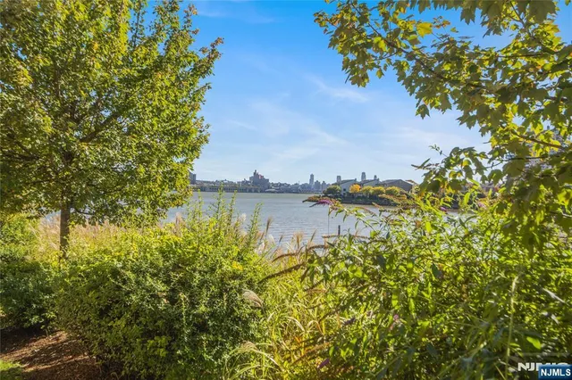 a view of a storage & utility room with dryer and washer