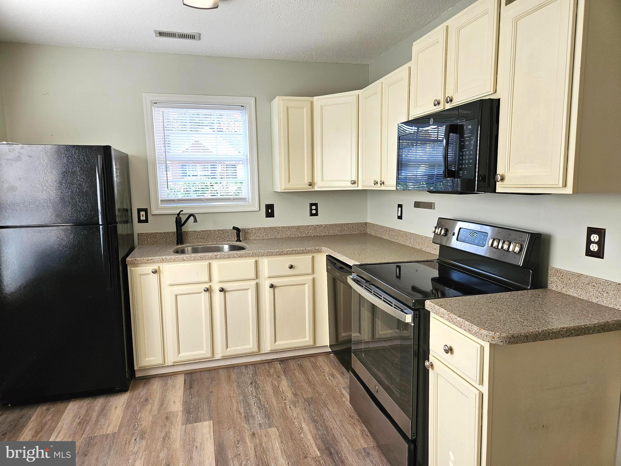 791 Ripplebrook Drive Culpeper, VA 22701 - Photo 11 of 35 Bright and open kitchen area.