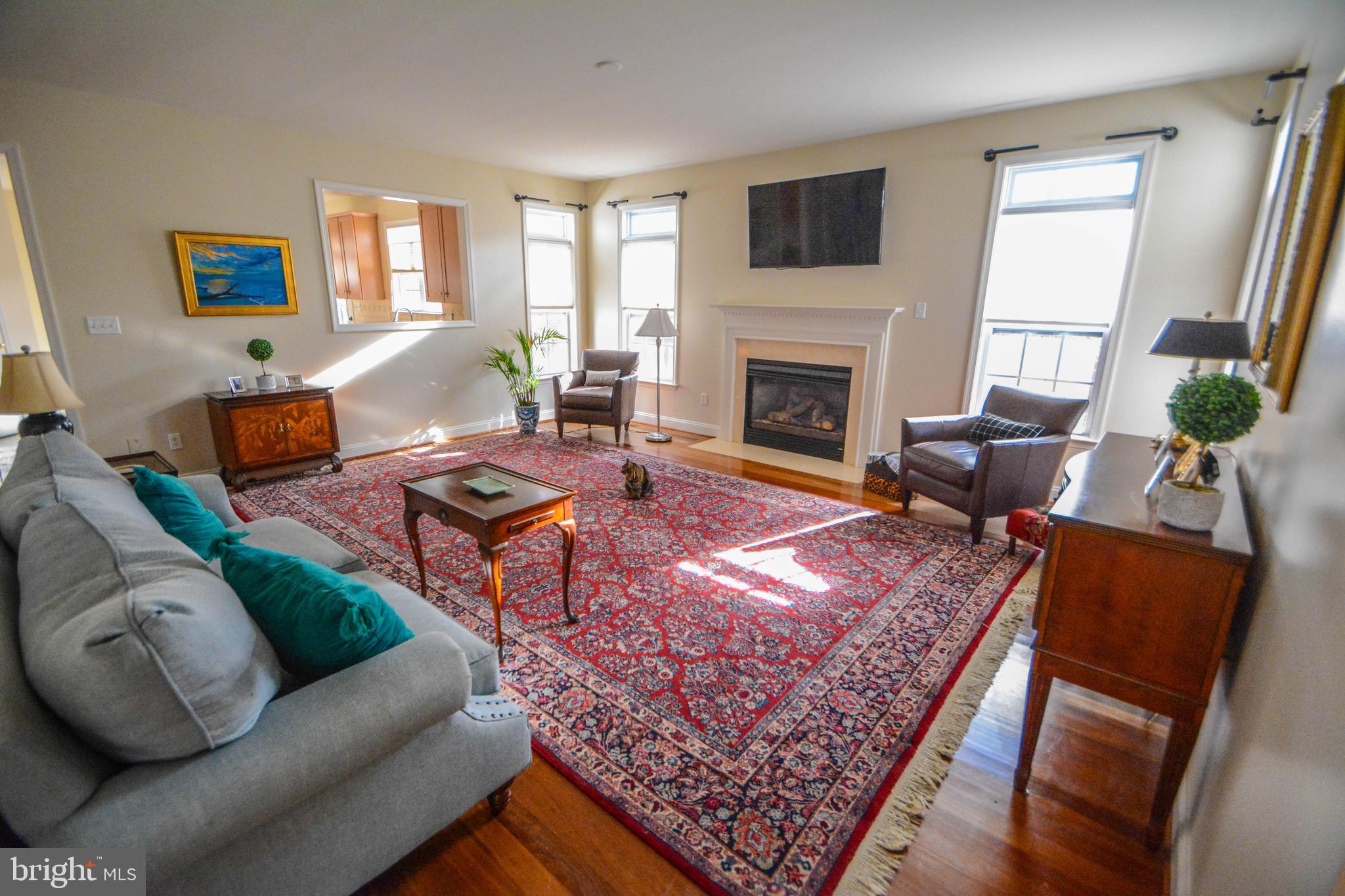 104 Camp David Road Wilmington, DE 19810 - Photo 11 of 32 a living room with furniture and a fireplace