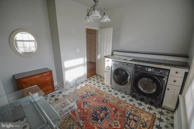 a bedroom with a bed and a window in it