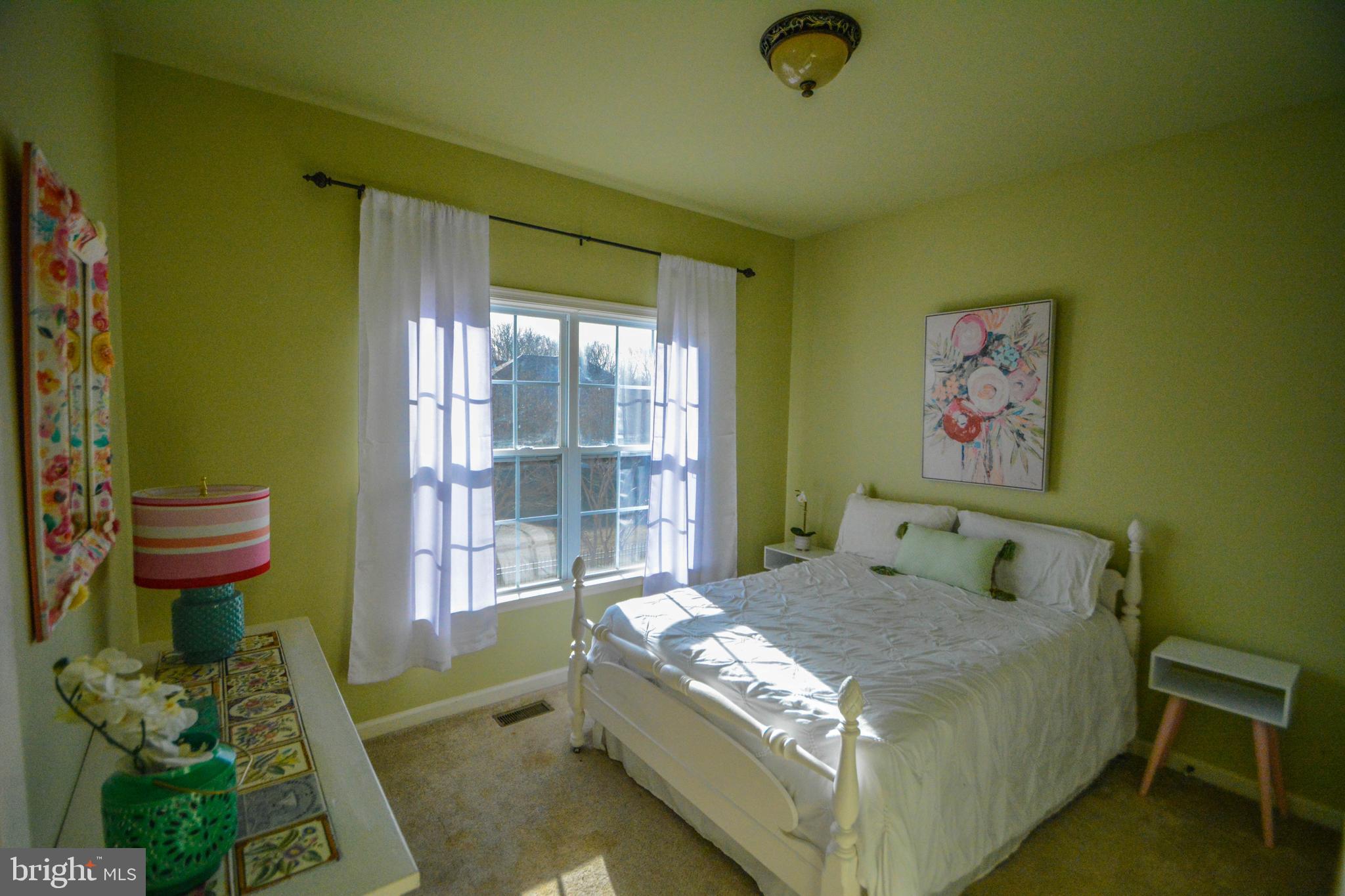 104 Camp David Road Wilmington, DE 19810 - Photo 24 of 32 a bedroom with a bed and a window
