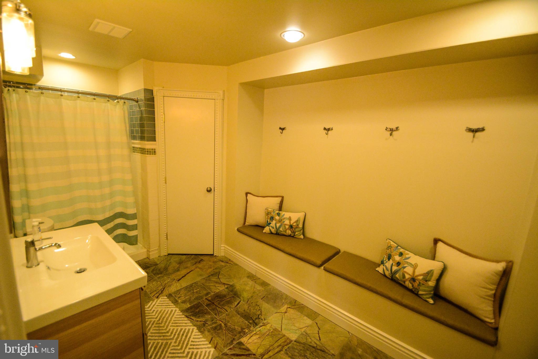 104 Camp David Road Wilmington, DE 19810 - Photo 32 of 32 a bedroom with a bed and wooden floor