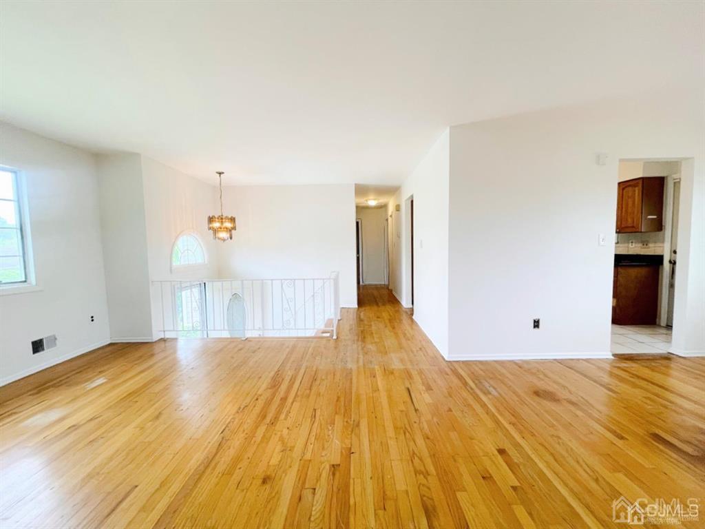 63 Dalton Place Edison, NJ 08817 - Photo 11 of 31 a view of empty room with wooden floor