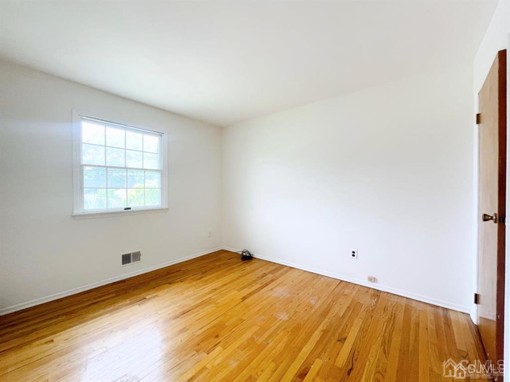 63 Dalton Place Edison, NJ 08817 - Photo 22 of 31 an empty room with a window