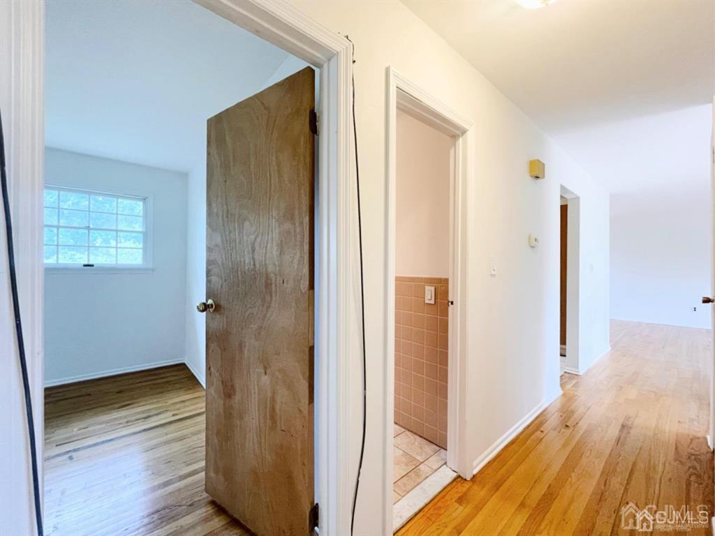 63 Dalton Place Edison, NJ 08817 - Photo 24 of 31 a view of hallway with wooden floor