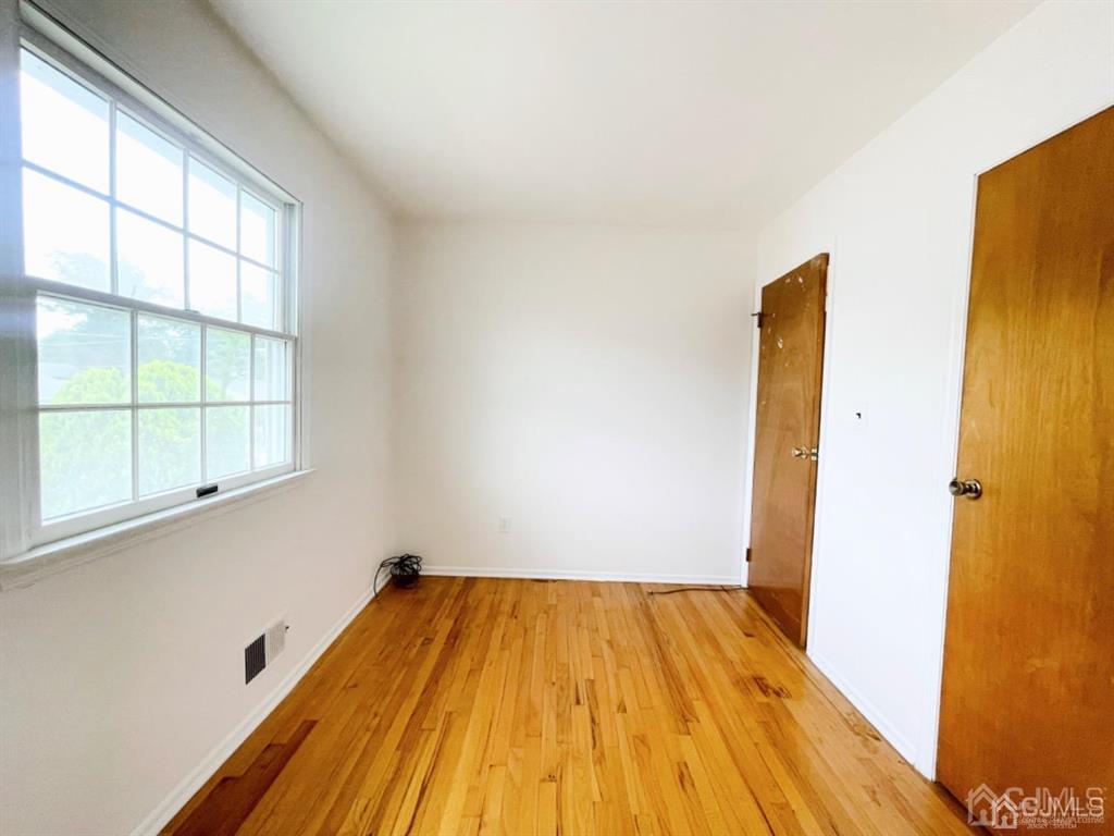 63 Dalton Place Edison, NJ 08817 - Photo 26 of 31 a view of a room with wooden floor and small window