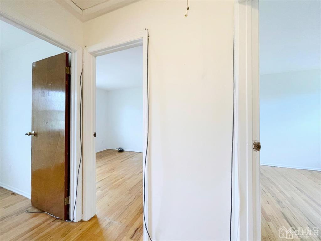 63 Dalton Place Edison, NJ 08817 - Photo 27 of 31 a view of a bedroom from a hallway