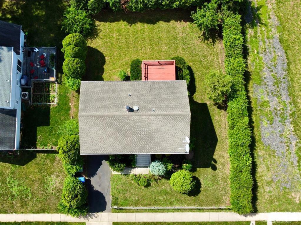 63 Dalton Place Edison, NJ 08817 - Photo 4 of 31 an aerial view of a house with a yard and large trees
