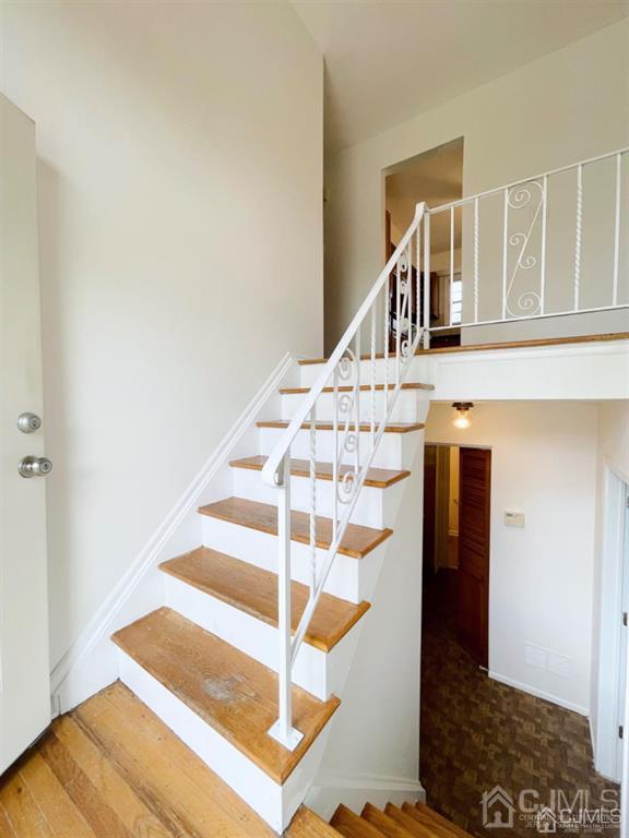 63 Dalton Place Edison, NJ 08817 - Photo 5 of 31 a view of staircase with white walls