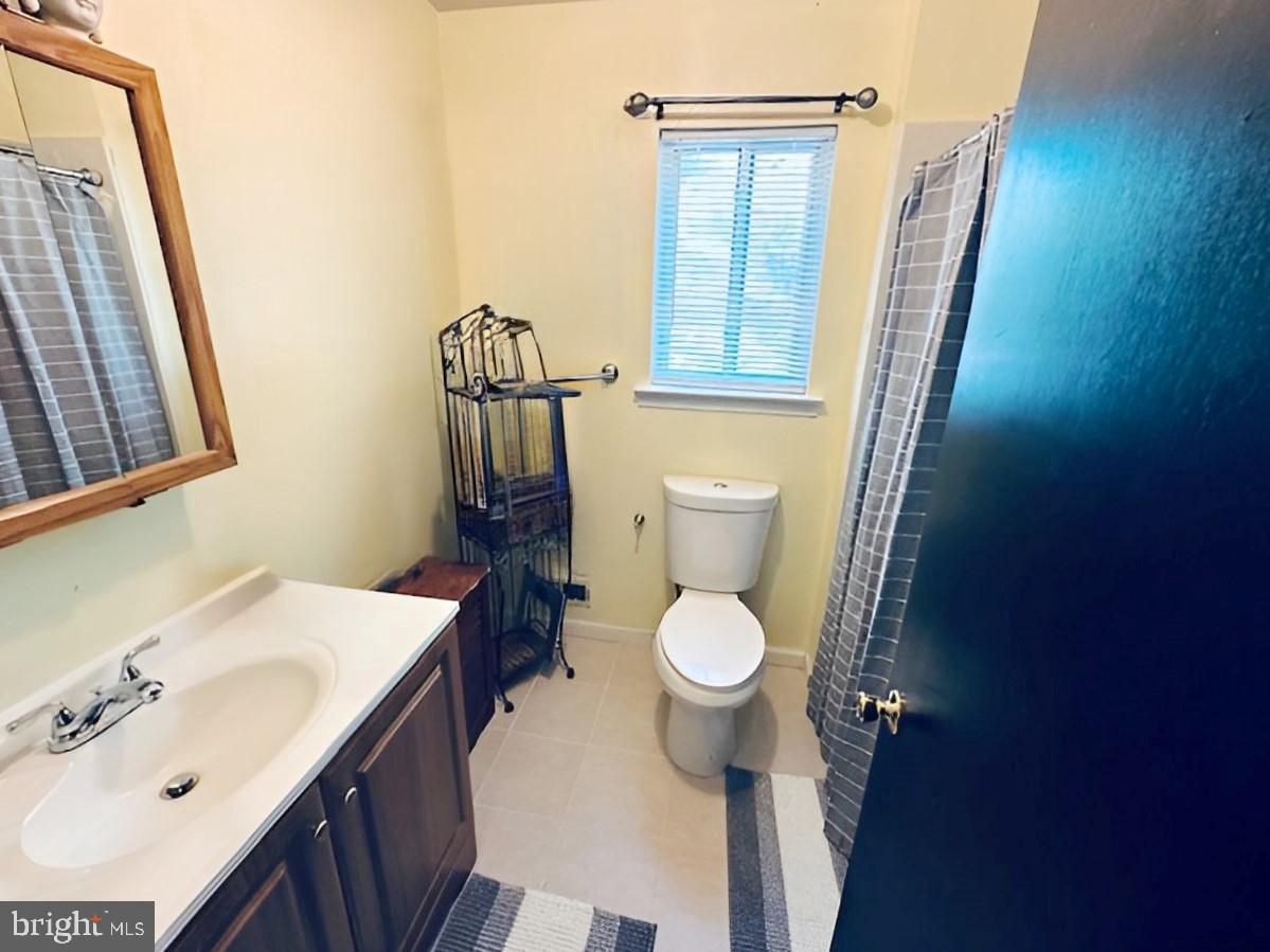 2 Devonshire Court Trenton, NJ 08628 - Photo 11 of 22 a bathroom with a sink a toilet and shower