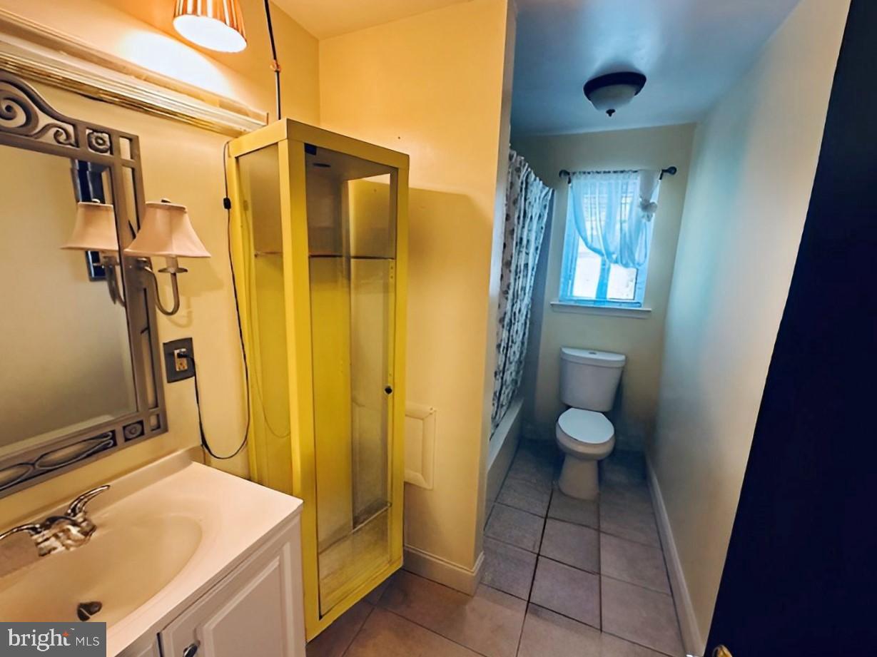 2 Devonshire Court Trenton, NJ 08628 - Photo 12 of 22 a bathroom with a granite countertop sink and a mirror