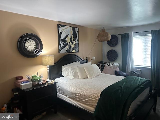 2 Devonshire Court Trenton, NJ 08628 - Photo 14 of 22 a bedroom with a bed and a painting on the wall