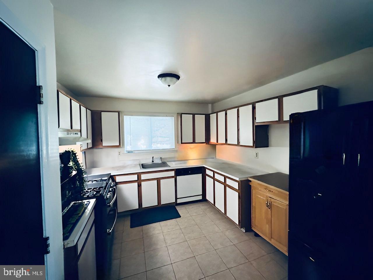 2 Devonshire Court Trenton, NJ 08628 - Photo 9 of 22 a kitchen with stainless steel appliances granite countertop a sink and stove