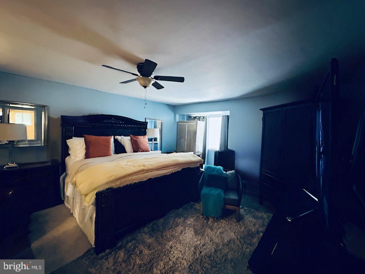 2 Devonshire Court Trenton, NJ 08628 - Photo 10 of 22 a bedroom with a bed and a chandelier