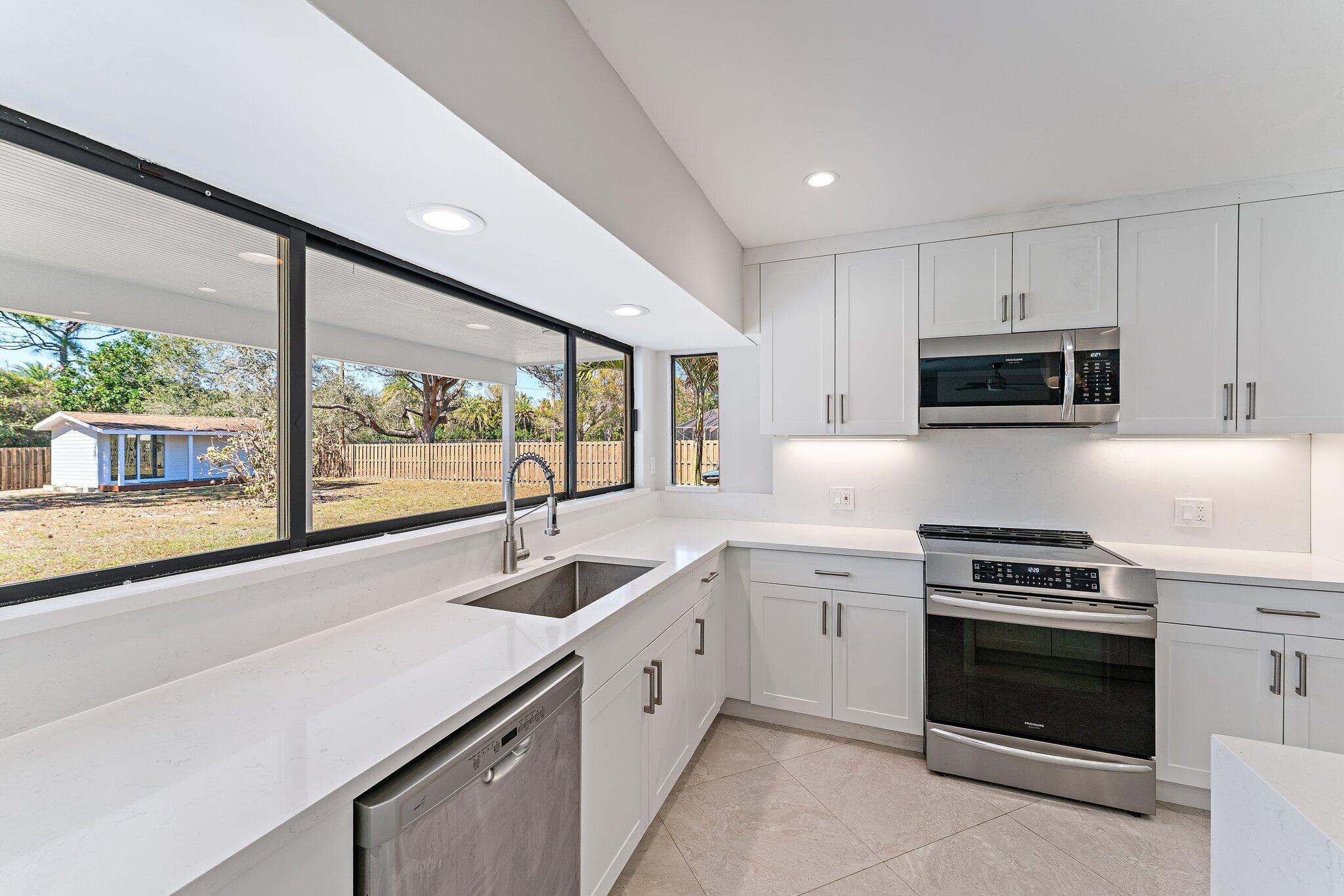 5883 Set-N-Sun Place Jupiter, FL 33458 - Photo 19 of 42 043-5883SetNSunPl-Jupiter-SMALL