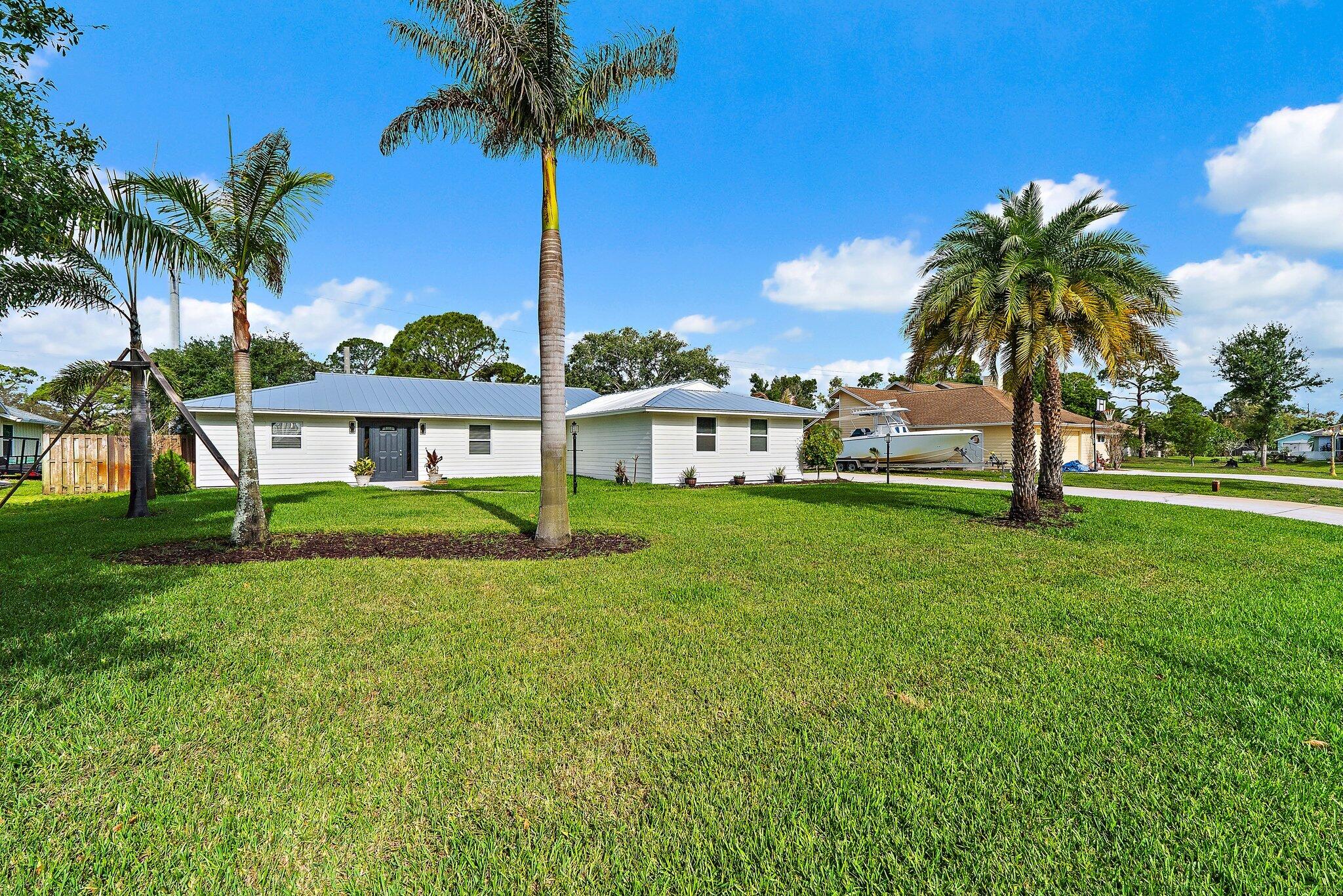 5883 Set-N-Sun Place Jupiter, FL 33458 - Photo 3 of 42 023-5883SetNSunPl-Jupiter-SMALL