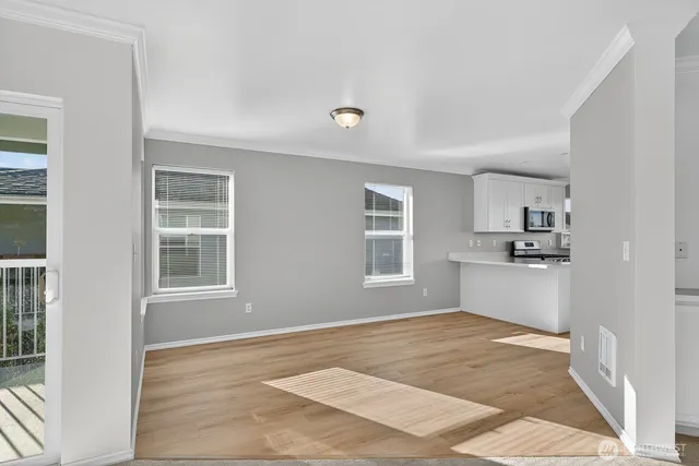 a view of a kitchen with a sink cabinets and a window