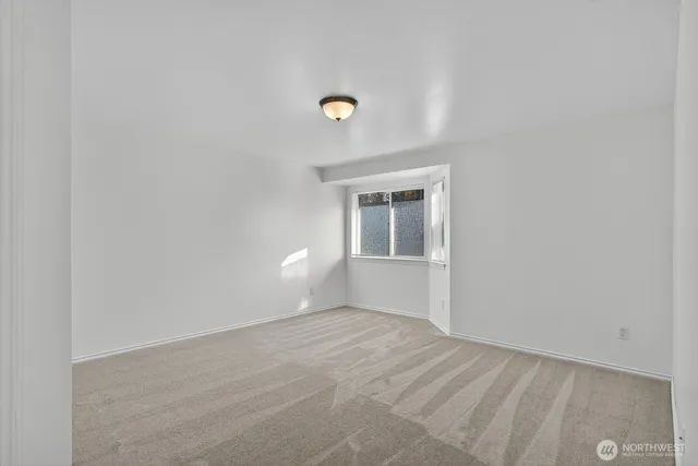 a view of an empty room with window