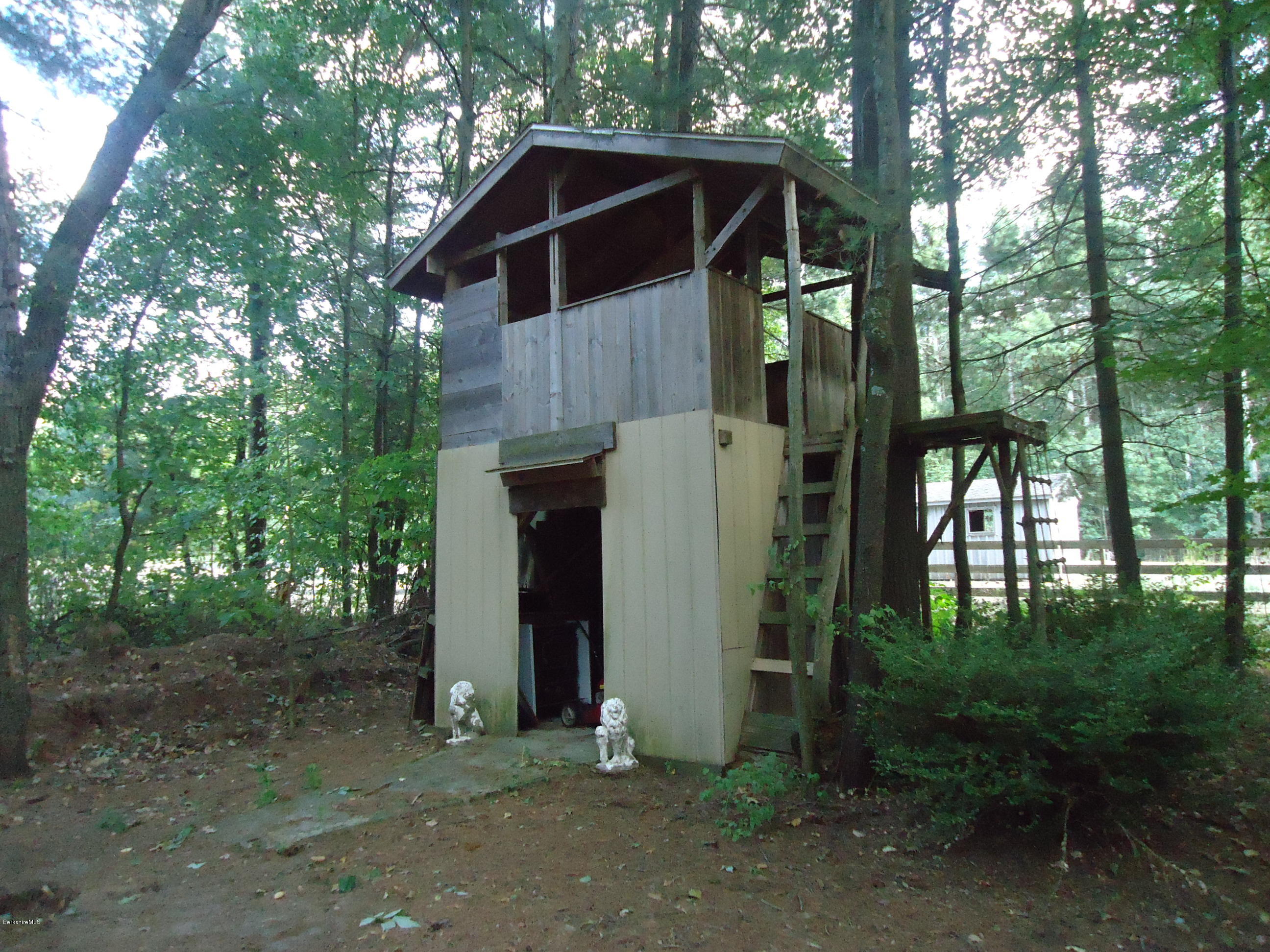 209 Polikoff Road Sheffield, MA 01222 - Photo 14 of 16 a front view of a house with garden