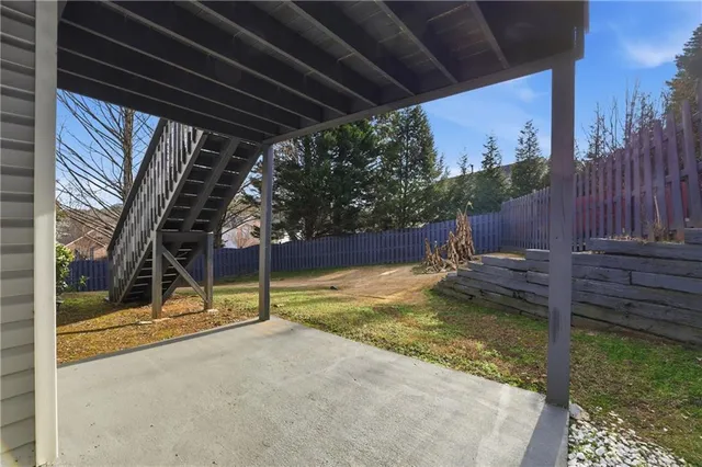 a view of swimming pool with a backyard