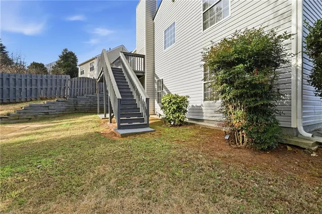 a view of a backyard with a small cabin
