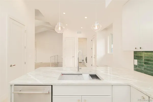 a view of a livingroom with a staircase
