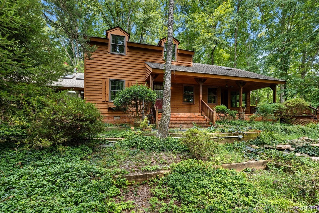 1600 Beaverdam Creek Road Crozier, VA 23039 - Photo 2 of 45 a front view of a house with garden