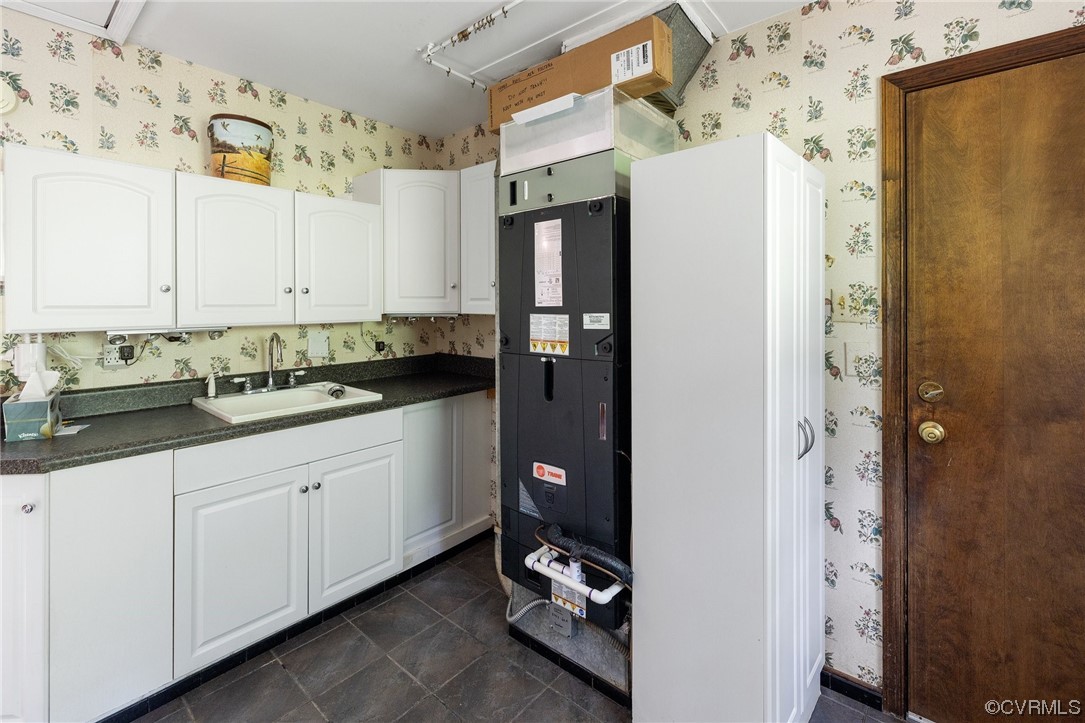 1600 Beaverdam Creek Road Crozier, VA 23039 - Photo 22 of 45 a kitchen with stainless steel appliances granite countertop a refrigerator and a sink