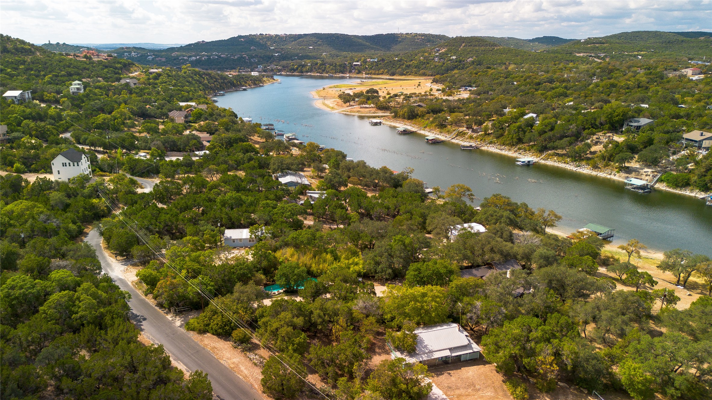 11104 Beach Road Leander, TX 78641 - Photo 9 of 21 Drone / aerial view of a water and mountain view