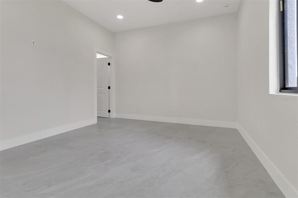 4501 15th Street Southwest Lehigh Acres, FL 33973 - Photo 13 of 40 a view of an empty room