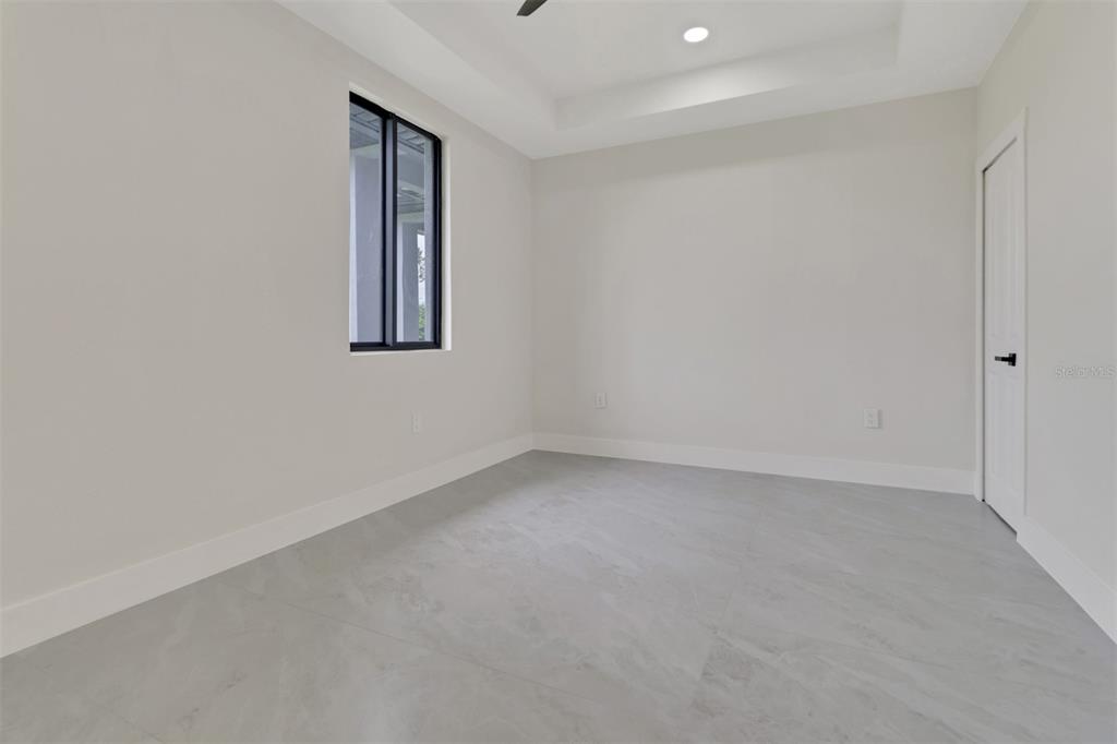 4501 15th Street Southwest Lehigh Acres, FL 33973 - Photo 21 of 40 a view of an empty room