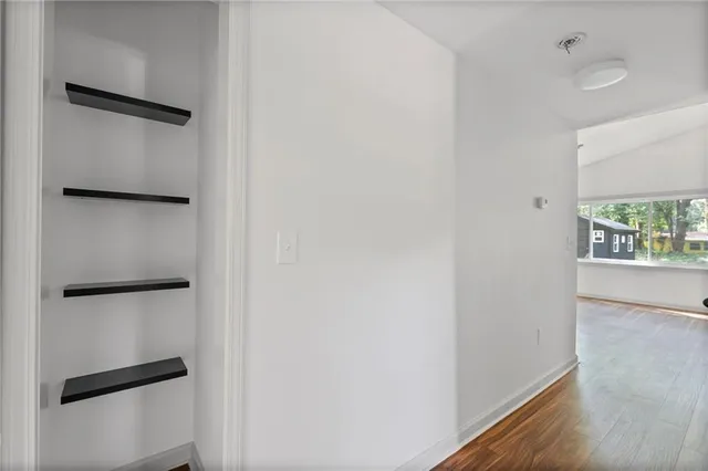 a view of walk in closet with window