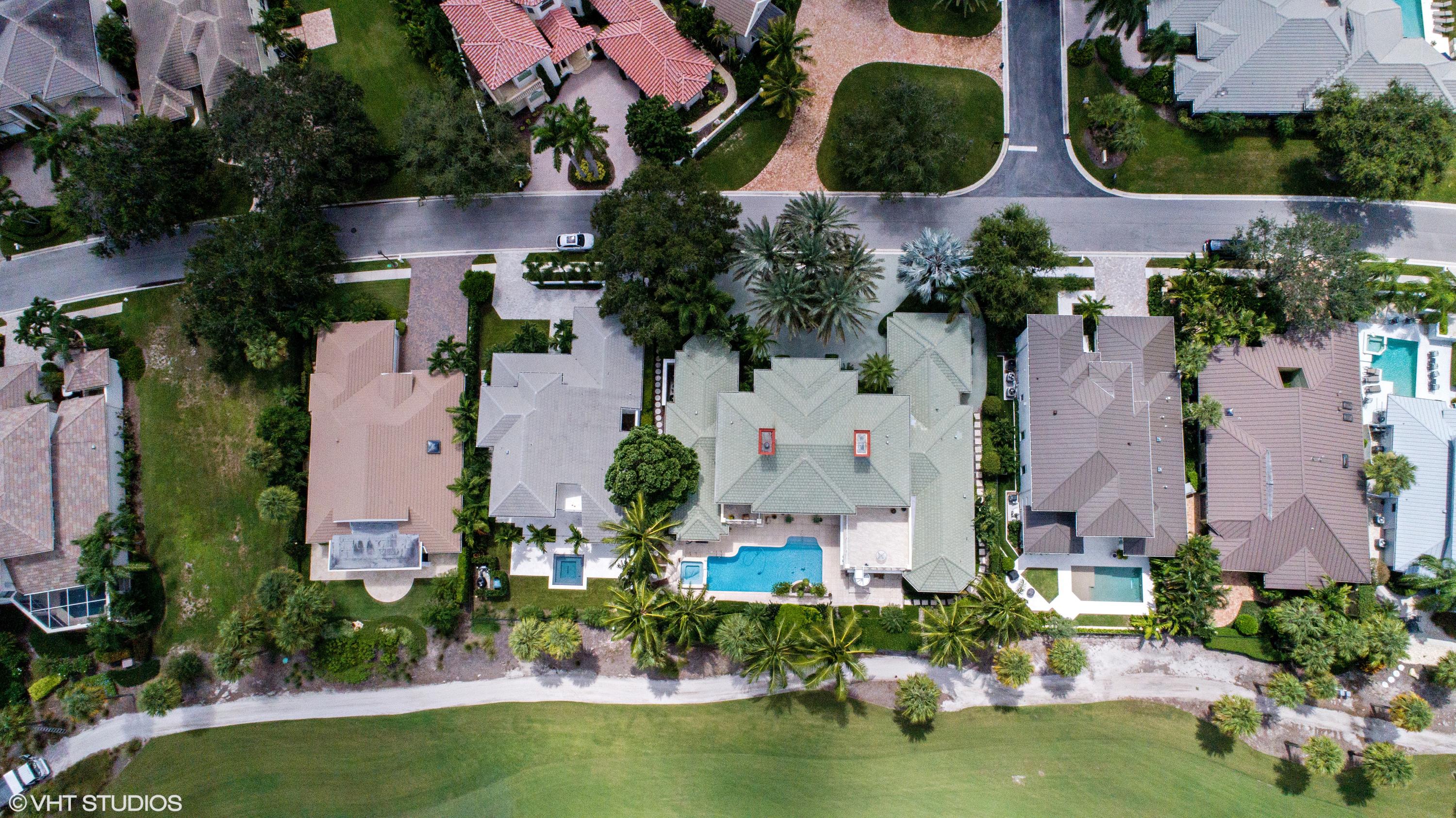 119 Terrapin Trail Jupiter, FL 33458 - Photo 3 of 41 an aerial view of a house with a swimming pool and outdoor space