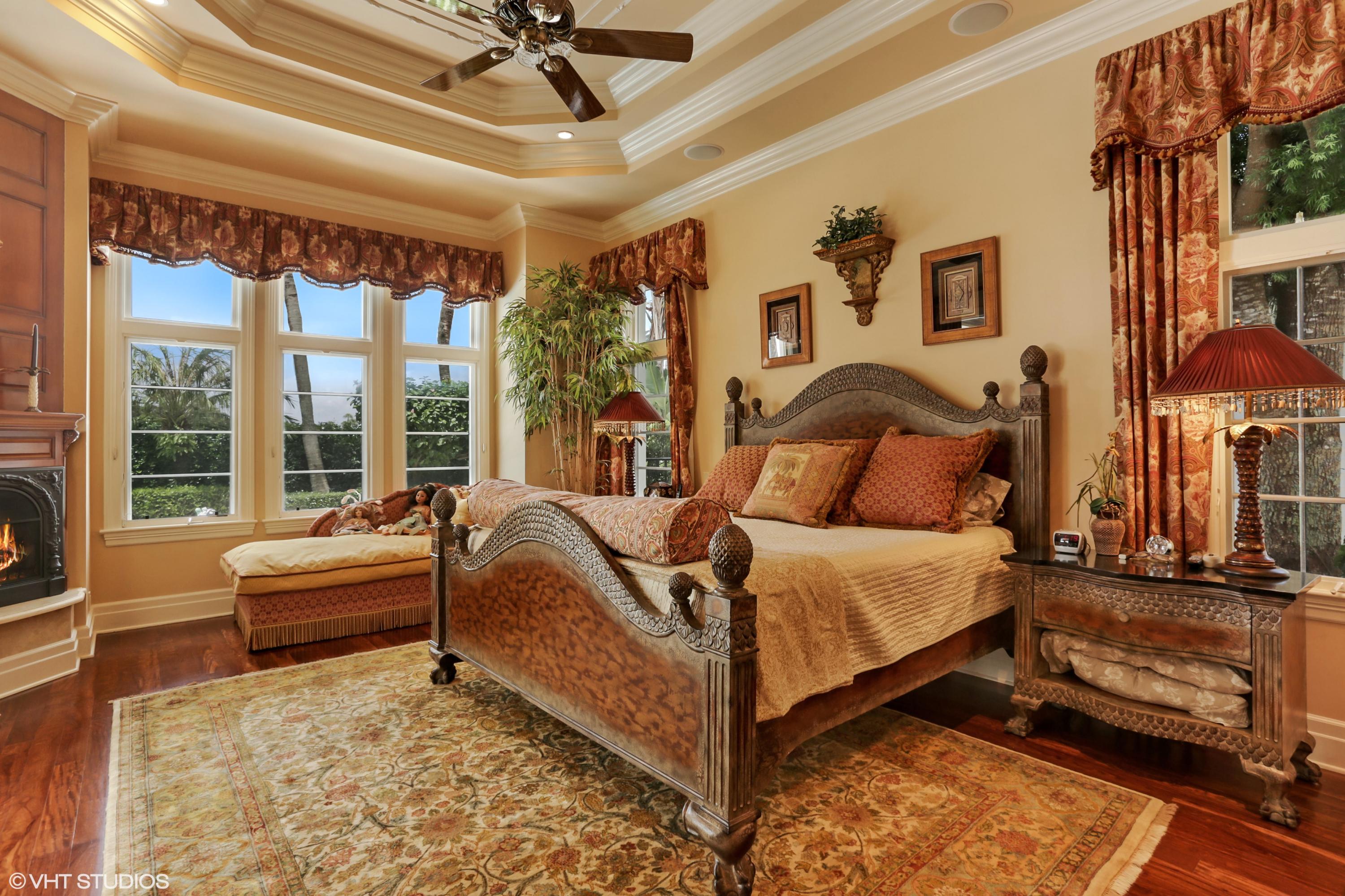 119 Terrapin Trail Jupiter, FL 33458 - Photo 29 of 41 a bed room with a bed and a couch