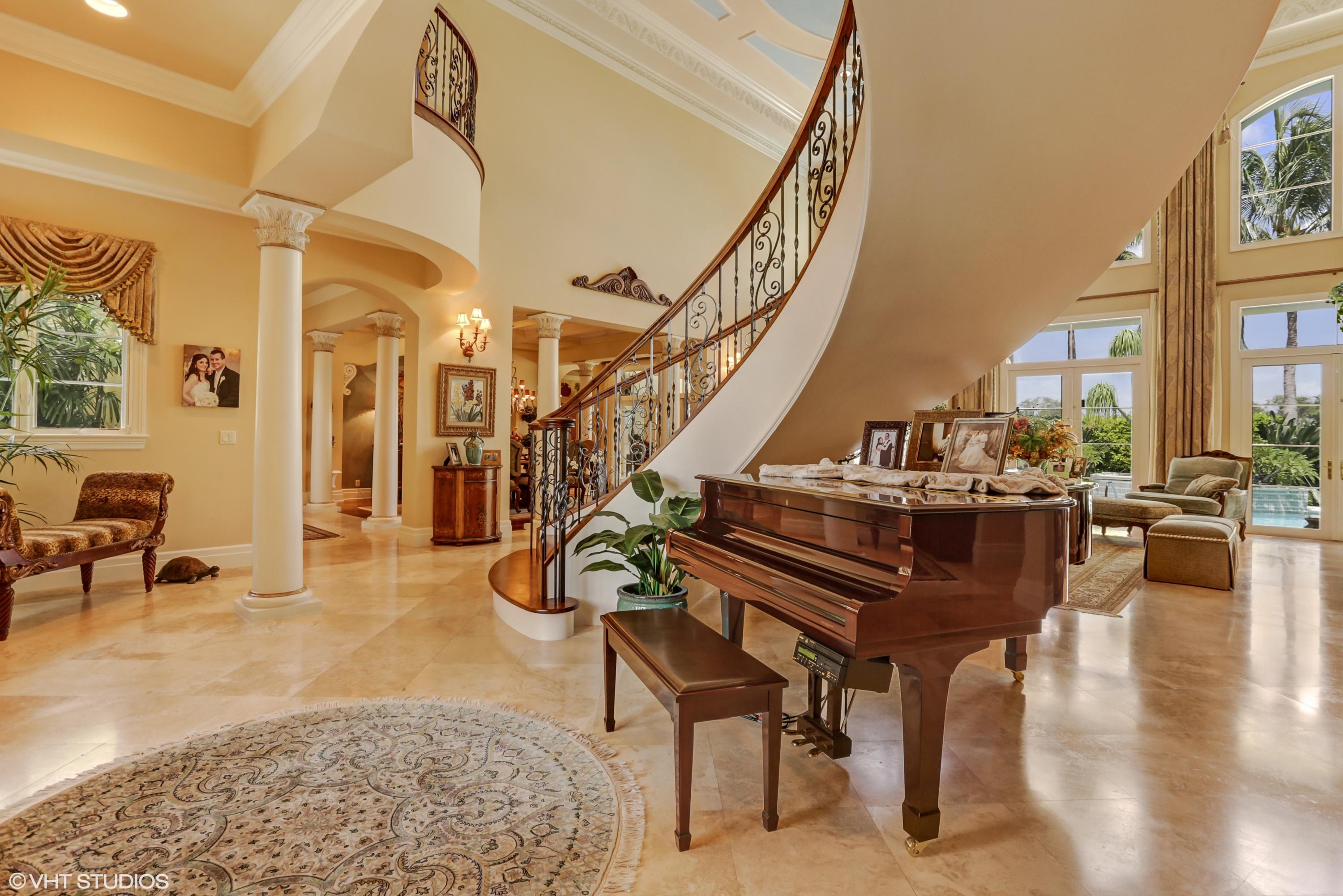 119 Terrapin Trail Jupiter, FL 33458 - Photo 40 of 41 a living room with lots of furniture and a wooden floor