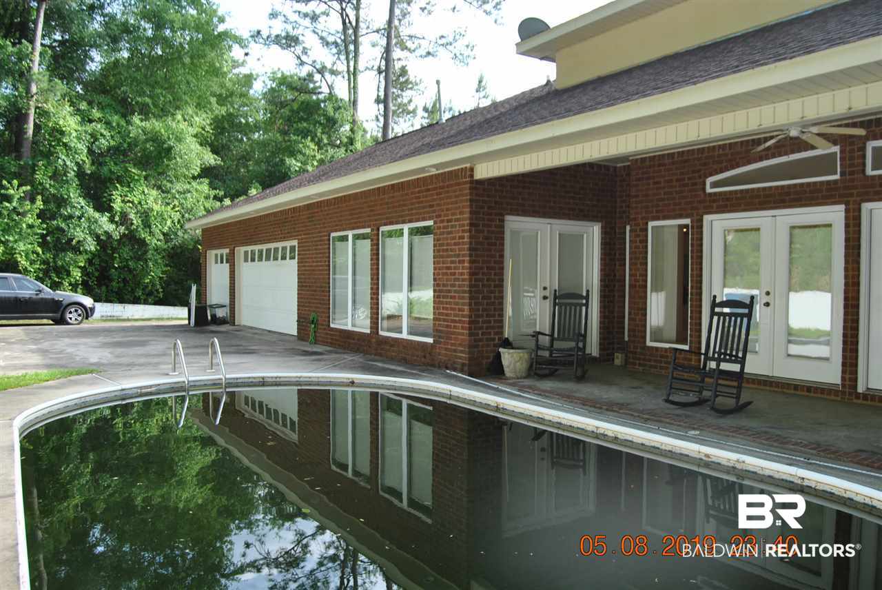 411 Juniper Creek Road Brewton, AL 36426 - Photo 33 of 35 another view of pool and back of home