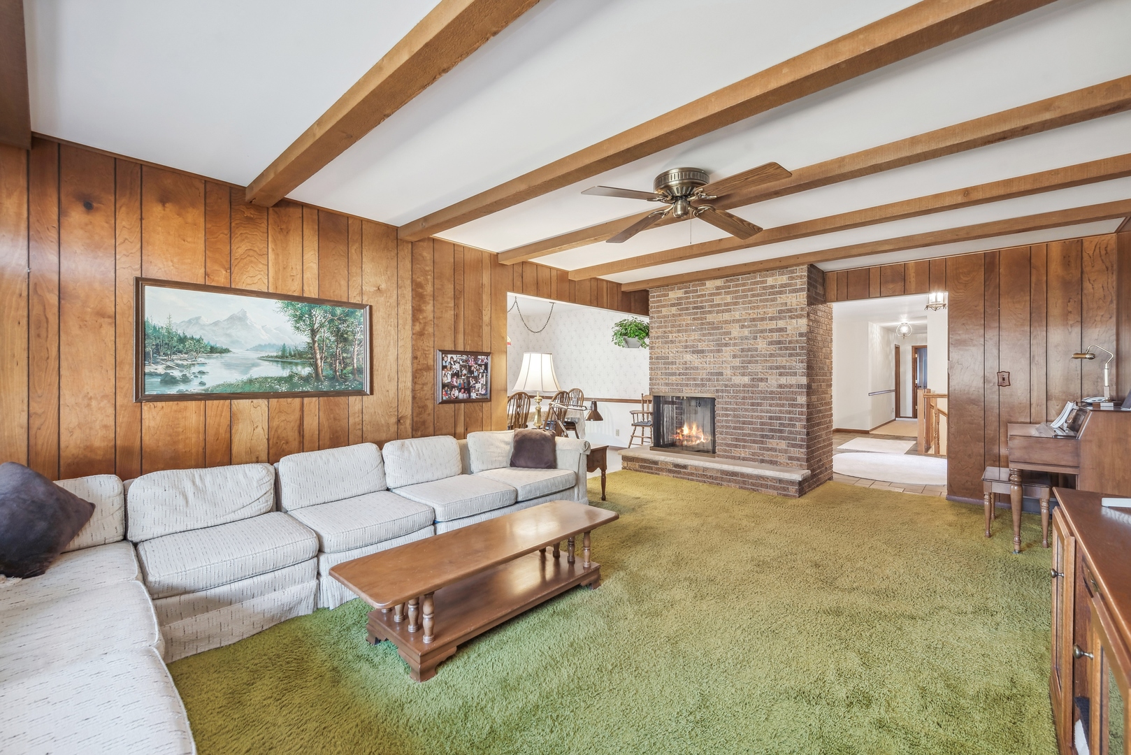 17445 Livingston School Road Caledonia, IL 61011 - Photo 12 of 33 a living room with furniture and a fireplace