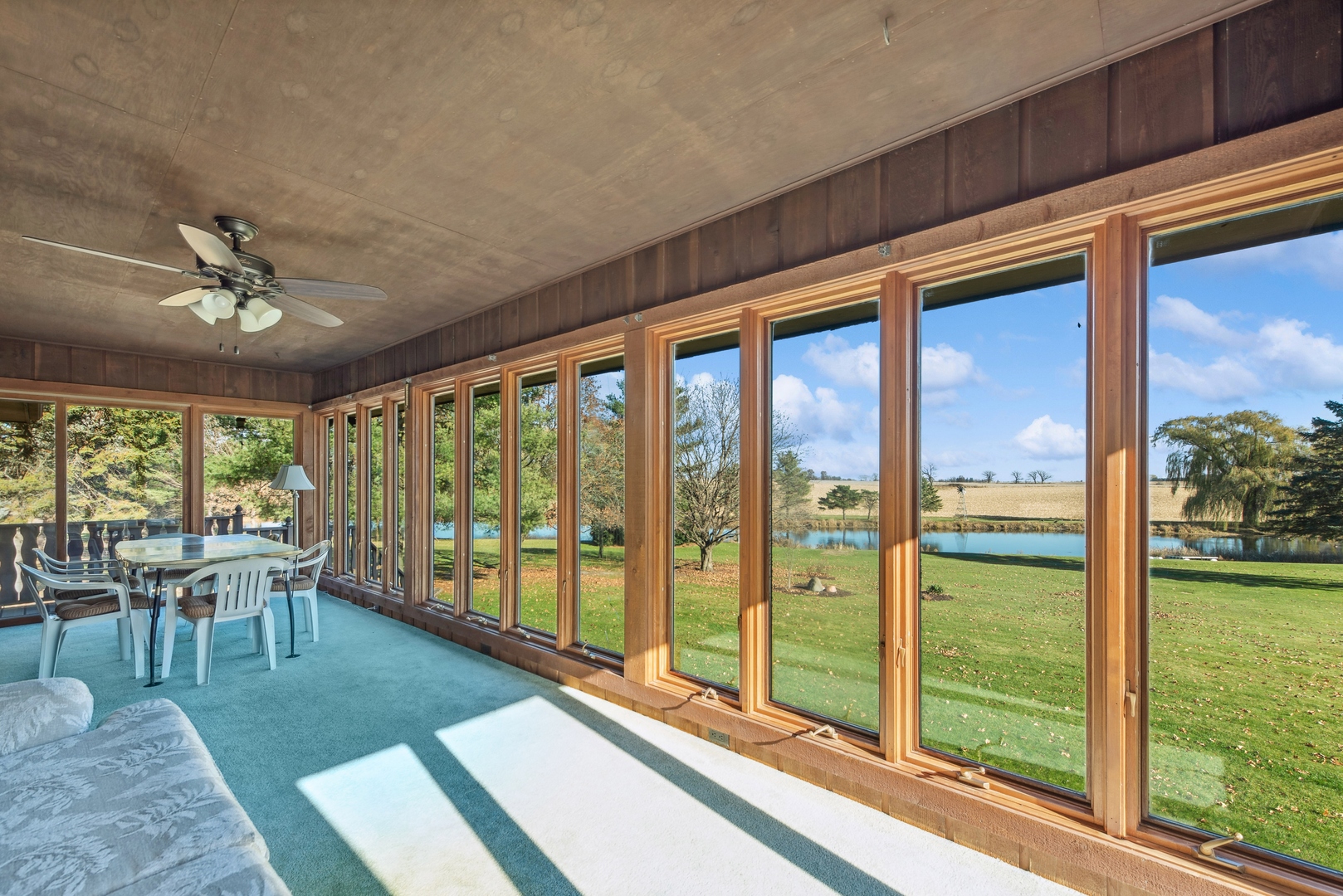 17445 Livingston School Road Caledonia, IL 61011 - Photo 15 of 33 a living room with hardwood floor and large windows