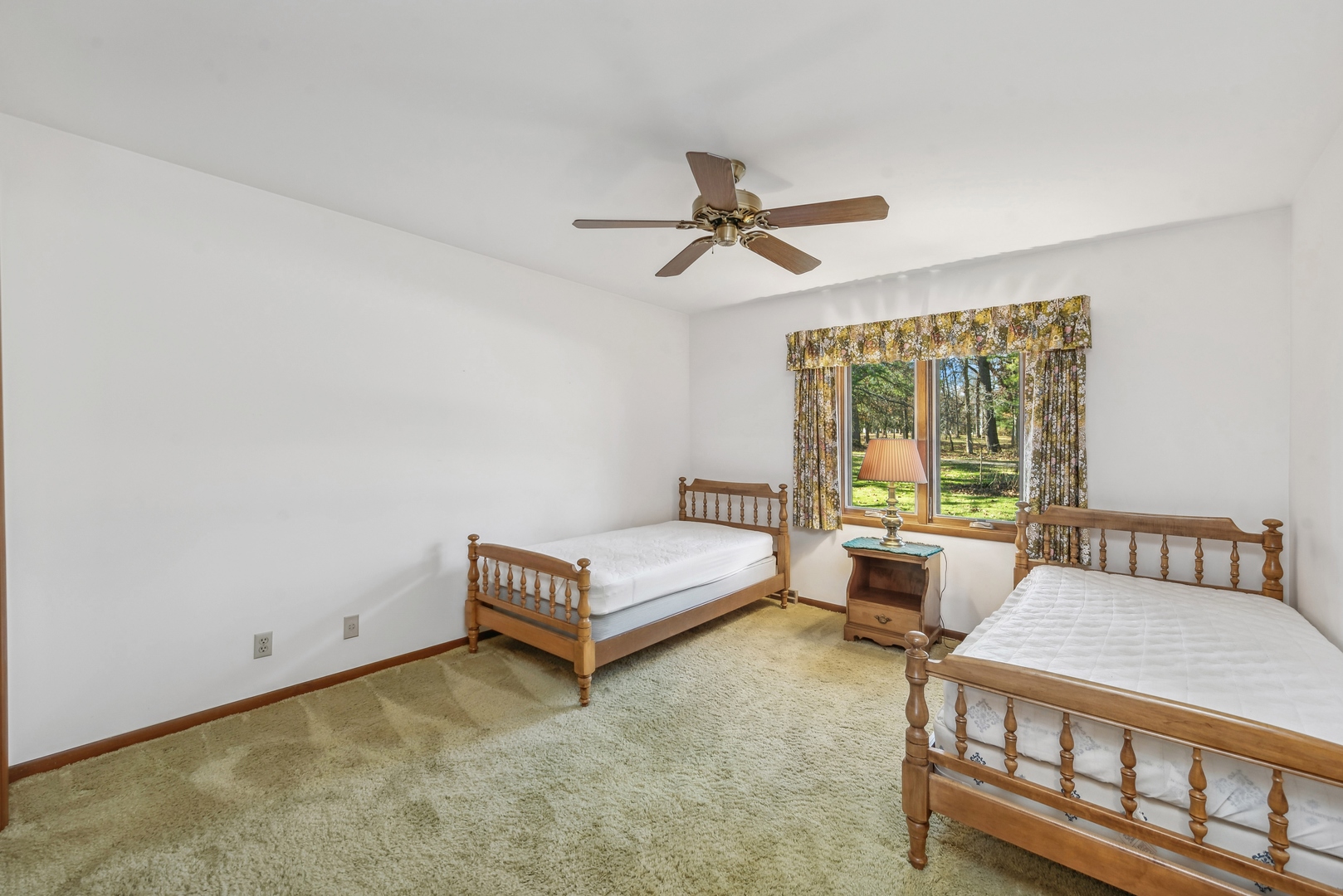 17445 Livingston School Road Caledonia, IL 61011 - Photo 18 of 33 a bedroom with furniture and a window